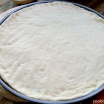 pizza dough on the pan